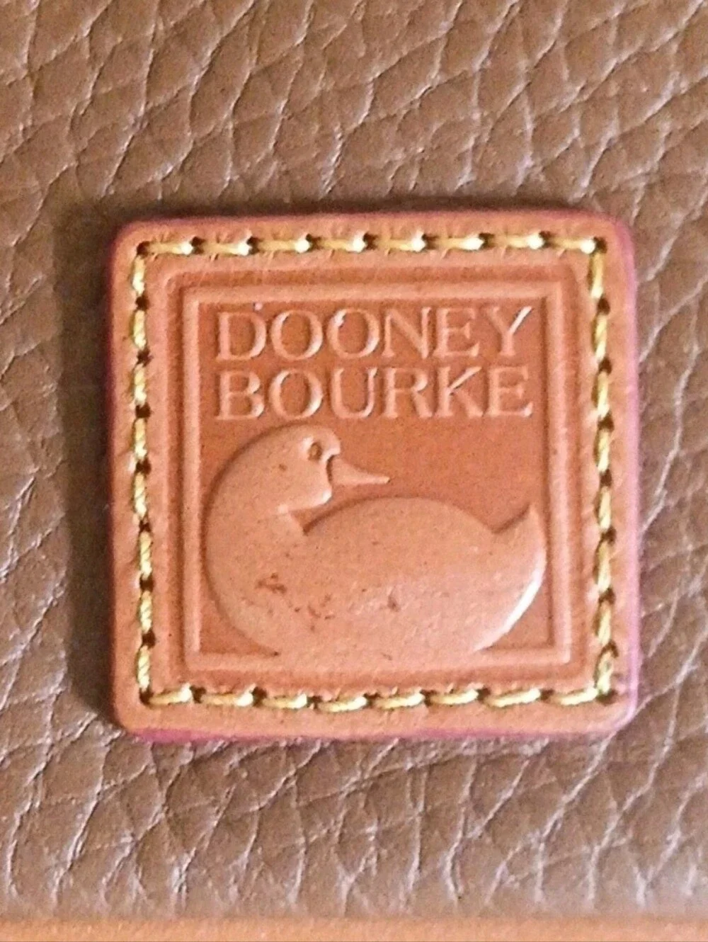 Dooney and Bourke Small Pebbled Leather Wristlet Caramel